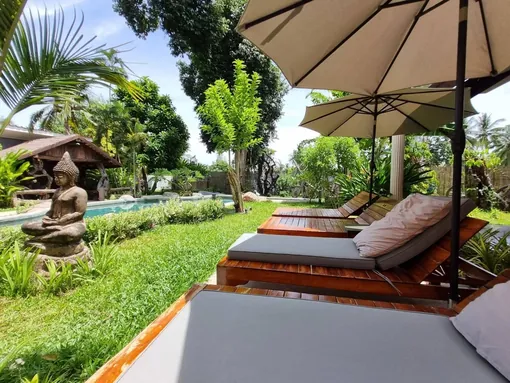 Sun loungers under parasols